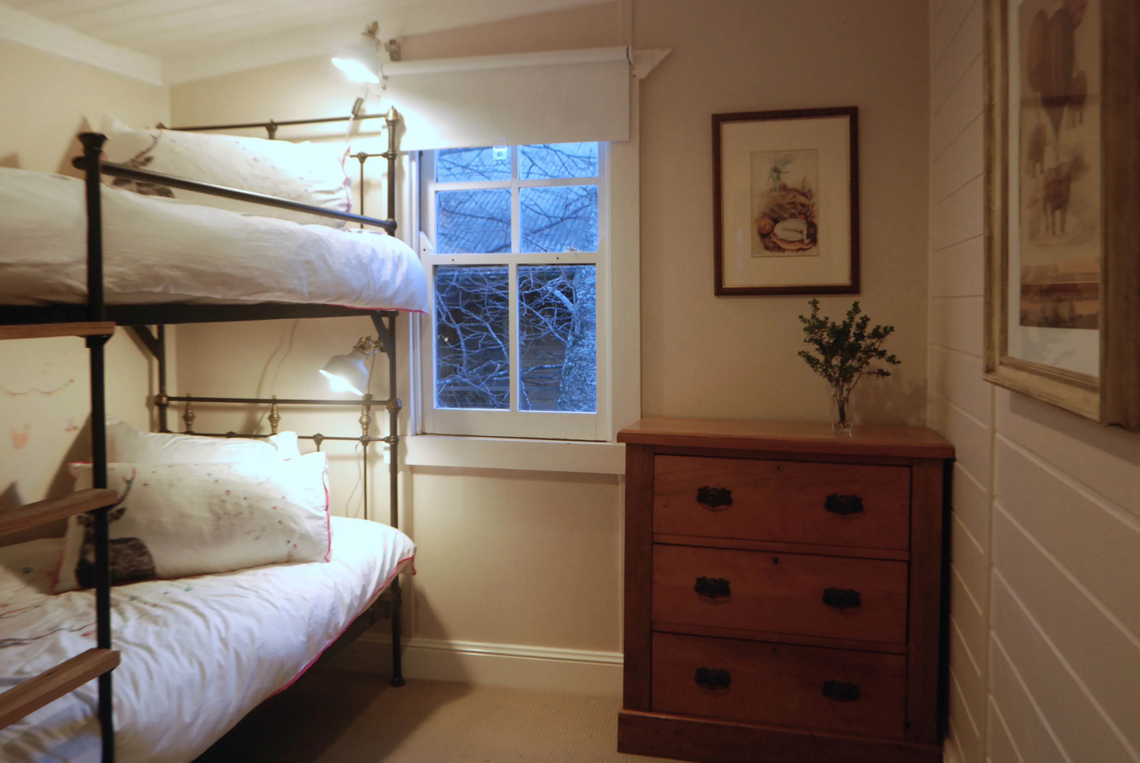 The bunk room with heritage iron bunks